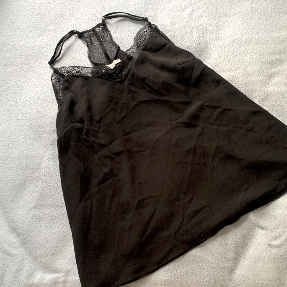 Women's Lace Trimmed Black Tank. Never worn. Fits Big.